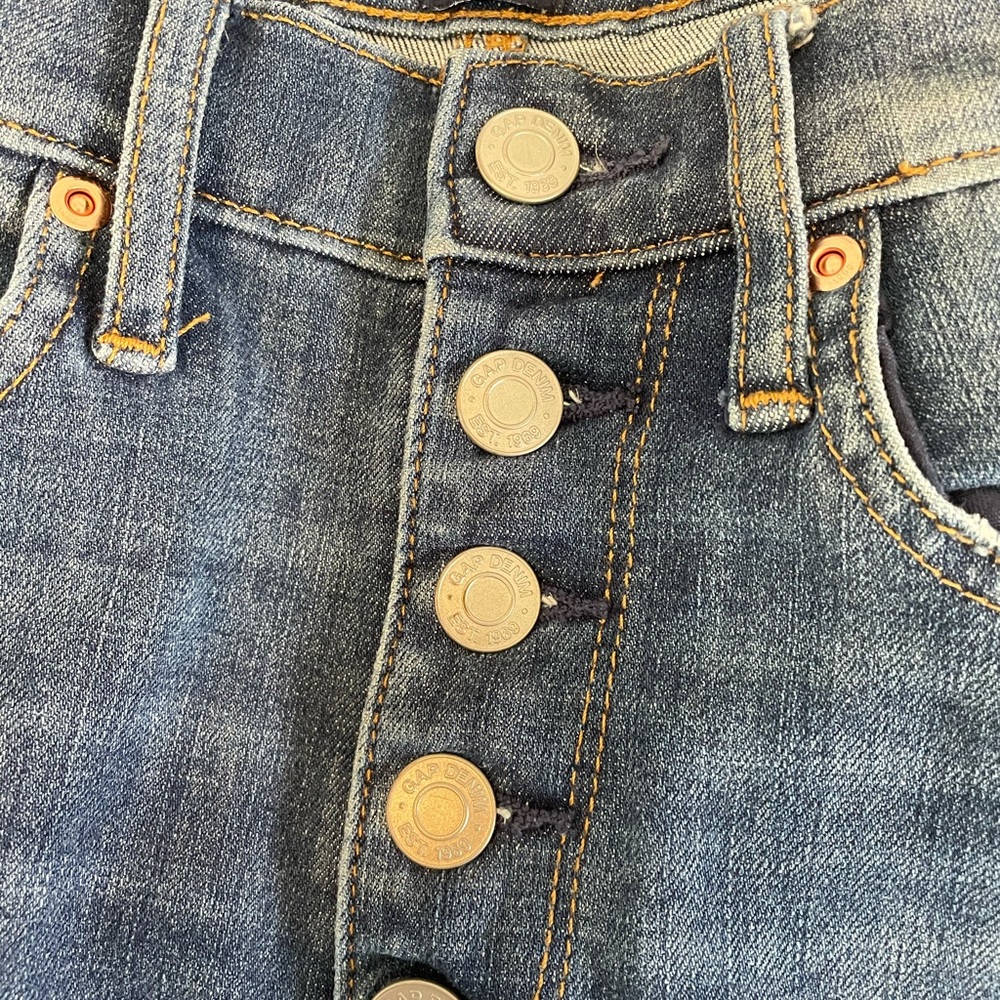 Buttonfly skinny jeans